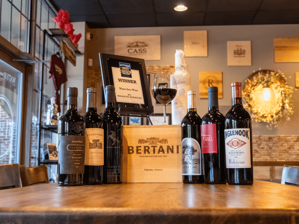 Wine bottles and an award at Water Into Wine.