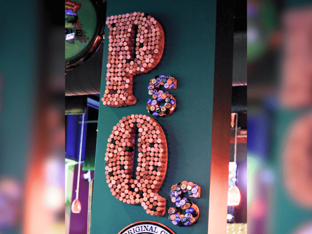 A wall hanging made of corks at Mind Yer P's & Q's.