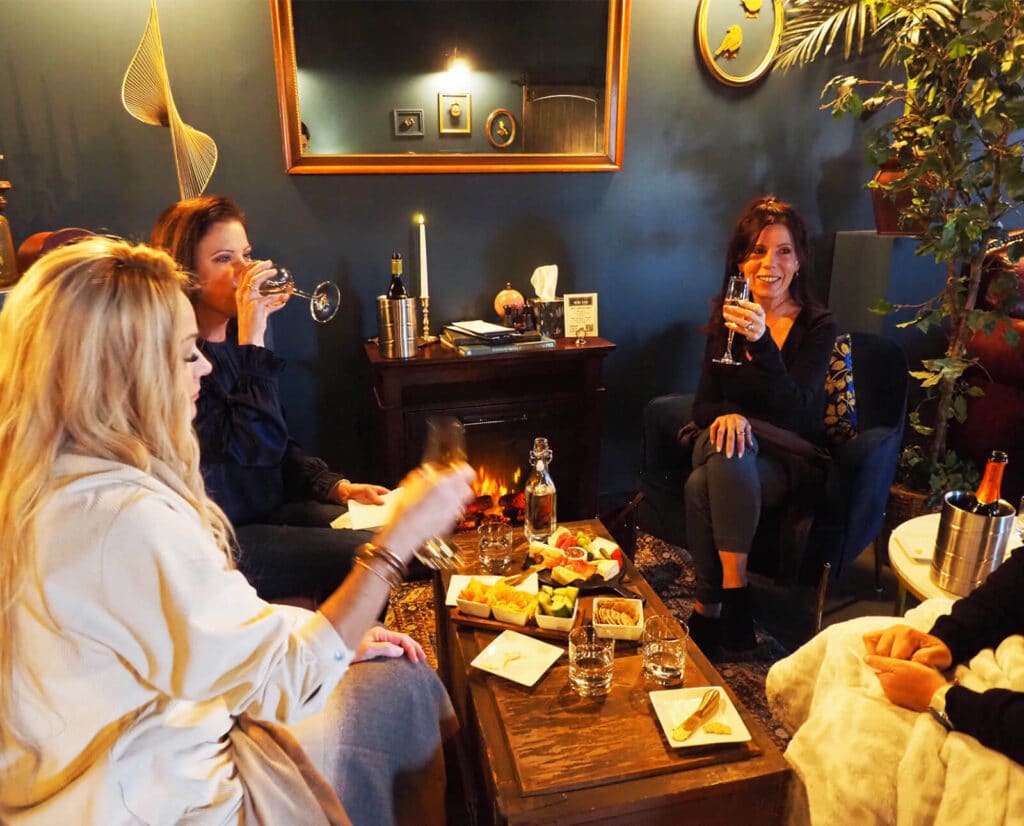 A group of women enjoying wine and charcuterie at Sparrow Wine Bar in Farragut, Tennessee.