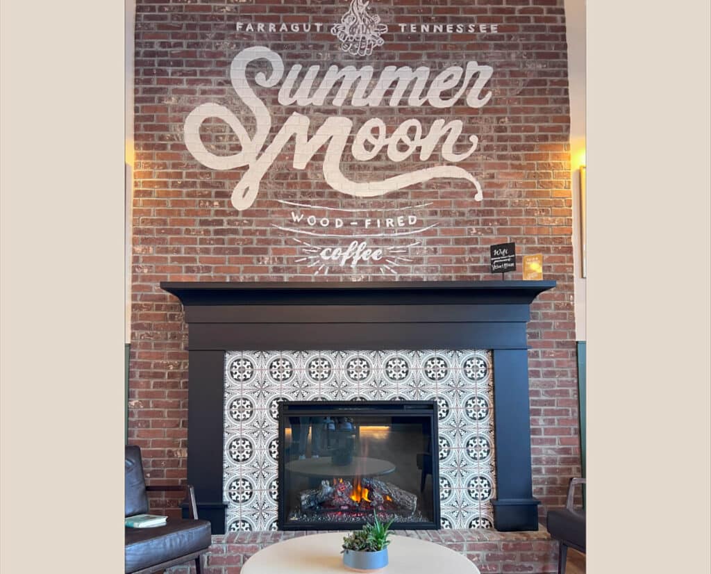 The fireplace and seating area at Summer Moon Coffee.